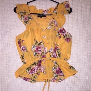 Almost Famous, Orange/Yellow floral top.